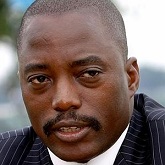 Congo's President Kabila speaks to journalists at a news conference in presidential gardens on the banks of the Congo River